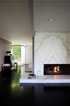 a living room with a fire place in it