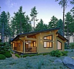 a small wooden cabin in the woods at dusk