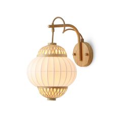 a wooden wall light with a white shade