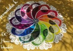 an image of a rainbow colored doily with the words pranandala ka