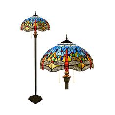 two stained glass lamps are sitting next to each other on a white background, one has a dragonfly design on it