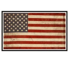 an old american flag with stars and stripes on the side, framed in black frame