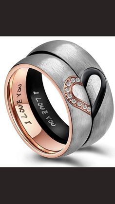 two tone stainless steel and rose gold plated heart shaped ring with crystal stones in the center