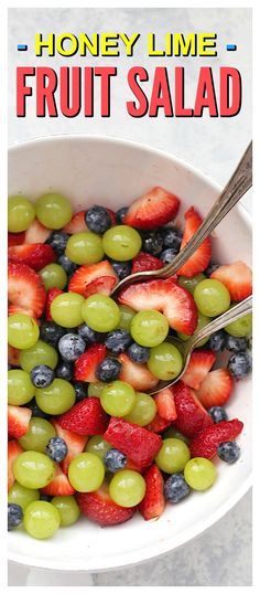 a white bowl filled with fruit salad on top of a table