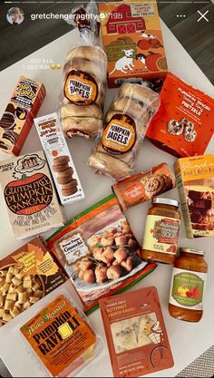 a table topped with lots of different types of food