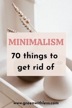 a white vase filled with flowers and the words minimalism 70 things to get rid of