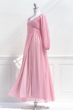 A fairytale-pink gown, the Persephone maxi dress in sparkling blush pink chiffon features a pleated bodice, long sleeves, smocked elastic back with zipper, a sweetheart neckline, and a full, sweeping skirt. Please Note- This item is final sale only. . Details: S: Bust 32"-36", Waist 26"-28", Length 58" M: Bust 34"-38", Waist 28"-30", Length 59" L: Bust 36"-40", Waist 30"-32", Length 60" Skirt Length Waist to Hem: 47" Center Back Zipper 100% Polyester Lined Dry Clean Only Imported Feminine Pink Long Sleeve Chiffon Dress, Pink Rennaisance Dress, Pink Long Sleeve Peasant Dress, Pink Flowy Georgette Maxi Dress, Light Pink Medieval Dress, Greek Chiton, Pleated Bodice, Pink Gowns, Romantic Dress