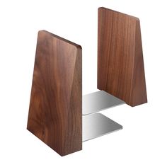 two wooden shelves with metal brackets on them