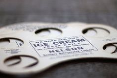 an ice cream bottle opener sitting on top of a table