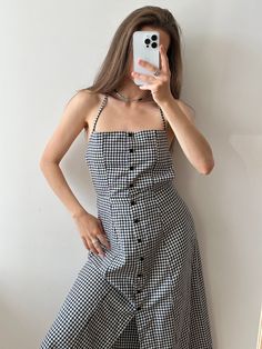 "Vintage check dress in black and white, the dress is very light, it is made of cotton, stunning open back, a-line type, below-the-knee (maxi) length, sleeveless, loose fit, fits XS-M, designed in Australia, handmade in Indonesia, small barely seen spot from the bottom, perfect condition  Measurements: Length 122 cm / 48\" (regulated straps) Bust from armpit to armpit 30.5 cm / 12\"  Model's height 166 cm / 65.4\"" Black Cotton Sleeveless Summer Dress, Summer A-line Plaid Dress, Fitted Sleeveless Dress For Summer Picnic, Summer A-line Maxi Dress For Picnic, Fitted Maxi Length Dress For Picnic, Fitted Maxi Dress For Summer Picnic, Chic Summer Maxi Dress For Picnic, Chic Maxi Dress For Picnic, Plaid Sleeveless Sundress For Beach