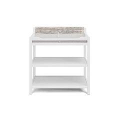 a white baby changing table with two shelves