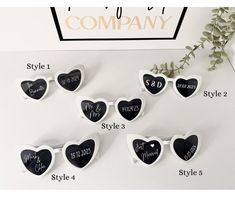 black and white heart shaped magnets with names on them