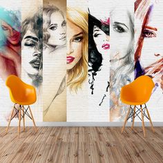 a room with a brick wall and an orange chair in front of it that has multiple images of women painted on it