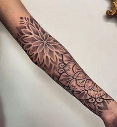 a person with a tattoo on their arm