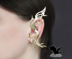 "Ear Cuff \"Flight of the Phoenix\" - rebirth. Made by hand on the individual sizes. This ear cuff shows a flying phoenix as a symbol of rebirth. The Phoenix or the Firebird is the personification of fire and endless rebirth. Possible materials of manufacture: \"Silver\" -  Nickel Silver (Jewelry alloy of silver color, does not contain silver. Other name: Maillechort, German silver.) \"Gold\" - Brass (Jewelry alloy of gold color) \"Sterling Silver\" - 925 Sterling Silver (This is a precious 925 alloy) All the jewelry in my shop is made by hand. With love and individually. This means that minor differences from the original are possible, but it also means that you receive a unique work of art. Term of manufacturing of the order of 2-4 weeks. I understand that this is a long time. But manual Silver Winged Fantasy Jewelry, Unique Gold Wing-shaped Jewelry, Fantasy Winged Jewelry Gift, Silver Wing-shaped Fantasy Jewelry, Silver Fantasy Wing-shaped Jewelry, Fantasy Silver Wing-shaped Jewelry, Phoenix Rebirth, The Firebird, Phoenix Jewelry