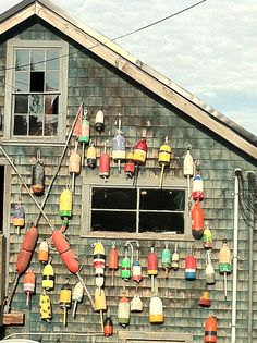 a building with many different types of buoys on it