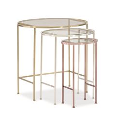 two metal and glass tables on white background