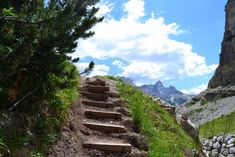 a set of stairs going up the side of a mountain