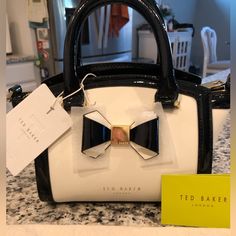 This Mini Tote From Ted Baker London Is A Must For Anyone. Very Stylish. Ted Baker Small Icon Bag, Ted Baker Purse, Ted Baker Wallet, Ted Baker London Bags, Ted Baker Floral Bag, Ted Baker Bag, London Bags, Black Leather Crossbody Bag, Ted Baker London