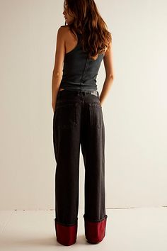 So slouchy and cool, these jeans from our We The Free collection are the perfect off-duty pair. **Fit:** Low-slung, slouchy wide-leg silhouette designed to be worn low on the hips **Features:** Six-pocket design, sewn cuffed hemlines, zip fly and button closure, lightweight rigid denim **Why We ❤ It:** Effortless with a baby tee or elevated with a billowy blouse, this pair has endless ways to wear. | We The Free Final Countdown Cuffed Low-Rise Jeans at Free People in Red, Size: 27 Casual Fit Jeans, Jeans At Work, Billowy Blouse, Low Rise Jeans Outfit, Free People Fall, Cool Pants, Final Countdown, Fall Pants, Ankle Length Jeans