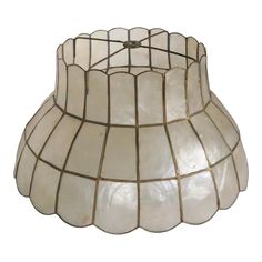 Impressive vintage Capiz shell lamp shade, in very fine, original, clean and ready to use condition. The shade features a doomed lower section with crown like upper section. It is constructed of Capiz shell panels, with a leaded metal frame.    Dia. at Bottom 16" x H 9" x Dia. at Top 9.5" Capiz Table Lamp, Capiz Shell Lamp Shade, Capiz Shell Lamp, Shell Lamp Shade, Shell Lampshade, Shell Lamp, Capiz Shell, Lamp Shades, House Inspo