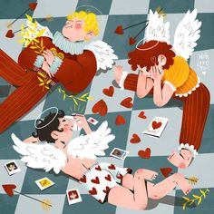 two angels are laying on the floor surrounded by cards and playing with eachother