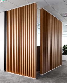 two wooden partitions in an office cubicle