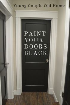 a black door with the words paint your doors black on it