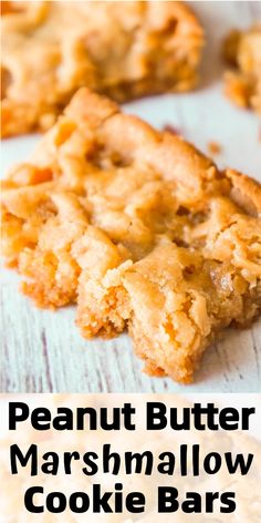 peanut butter marshmallow cookie bars on a table with text overlay that reads, peanut butter marshmallow cookie bars