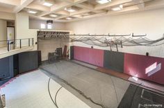 an indoor batting cage in the middle of a building