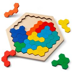 a wooden puzzle with different colors and shapes