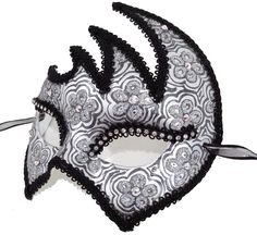 Black and silver paper mache mask. Hand decorated with a flower design, black trims, diamonte trim, glitter and AB crystals. Only one of its kind. Ribbon ties. Only one of its kind. Made in Australia. Laura Lucci Collection Black Masquerade, Black Masquerade Mask, Paper Mache Mask, Silver Paper, Costume Mask, Masquerade Mask, Ribbon Tie, Black Trim, Paper Mache