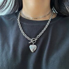 "Heart locket necklace with thicker chunky chain with round toggle and lobster.  *All materials are stainless steel (surgical steel), which will never tarnish or cause of allergies.  [Length] -19 inches+ adjustable chain 2\"  *Model is wearing 19\" inches.  *Can be customized the lengths.  Please convo to me if you need customized the length. [Content]  -Heart Pendant: 22x19mm -Toggle Diameter: 14mm -Chain Width: 7mm -100% Stainless Steel  ✅ Buyer supposed to place pictures yourselves. ✅ You can also check the different ver. of Heart locket necklace on the below link.  - https://www.etsy.com/listing/795918309/heart-locket-necklace-bold-chain?ref=shop_home_active_27&pro=1&frs=1 **Hypoallergenic and Non-Tarnish **Please watch the video for checking details.  **Measurements are an approximati Simple Locket, Locket Heart Necklace, Heart Locket Necklace, Jewelry Lookbook, Heart Locket, Locket Necklace, Shop Home, Last Minute Gifts, Heart Necklace