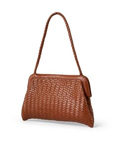 A chic new style from Bembien, the Le Sac is a sophisticated shoulder bag that is ideal for everyday wear. It features a woven leather exterior, a magnetic closure, and a small interior pouch to keep you organized on-the-go. Slip the Le Sac through your arm for rooftop gatherings under the stars or wear it with your favorite occasionwear for an easy daytime look. On-the-go Woven Leather Pouch Shoulder Bag, Woven Leather Satchel For On-the-go, Elegant Brown Hobo Bag With Woven Leather, Elegant Woven Leather Hobo Bag For Travel, Brown Intrecciato Weave Evening Shoulder Bag, Elegant Woven Leather Hobo Crossbody Bag, Elegant Woven Leather Crossbody Hobo Bag, Classic Brown Shoulder Bag With Woven Leather, Modern Shoulder Bag With Braided Handles Clutch