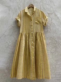 Casual Loose Striped Pocket Shirt Dress Yellow Cotton Button-up Dress, Yellow Button-up Cotton Dress, Striped Cotton Shirt Dress With Buttons, Casual Striped Button-up Dresses, Casual Striped Shirt Dress With Buttons, Striped Short Sleeve Dress With Buttons, Casual A-line Shirt Dress For Beach, Striped Buttoned Shirt Dress For Summer, Striped Shirt Dress With Buttons For Summer