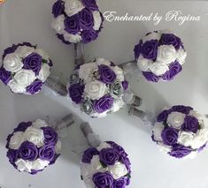 purple and white flowers are arranged on top of each other in the shape of bridal bouquets