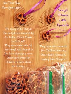 two bags of pretzels sitting next to each other on a wooden table with purple ribbon