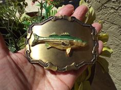 Vintage RAINTREE Fishermans SALMON Fish Belt Buckle. Made in 1977. Old new stock.Measures approx 3.65"(w)  x 2.75"(h) and fits up to 1.90" belt width.Never been worn. Brass Plated.Shipping for this beauty will be $5.00. Fish Belt, Maximum Effort, Salmon Fish, Apartment Decor Inspiration, Classic Vintage, Old And New