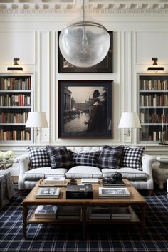 a living room filled with furniture and bookshelves