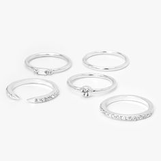 Add these trendy rings to to your jewelry party! This silver-tone set includes a mix of basic rings with faux gemstones and faux crystal embellishments. Sizes Available: 6/7, 8/9 Finish: Silver-tone Pack Size: Material: Metal - Claire's Silver Mixed Basic Rings - 5 Pack