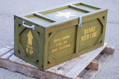 a crate sitting on top of pallets in the street