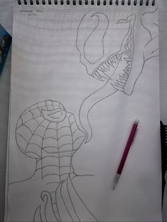 a pencil drawing of a lizard and a snake's head with its mouth open