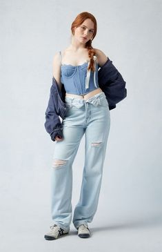 Upgrade your denim collection with PacSun's Eco Light Indigo Fold-Over Ripped '90s Boyfriend Jeans. Crafted from sustainably sourced cotton, these high-waisted jeans boast a fashionable fold-over waistband with a button fly closure, edgy ripped details, and a relaxed boyfriend fit, creating a perfect blend of comfort and style.

Learn more about PacSun eco items Folded Jeans Waist, Jeans Folded At The Waist, Light Ripped Jeans Outfit, Folded Jeans, Light Ripped Jeans, Thrift Wishlist, Folding Jeans, 90s Boyfriend, Ripped Jeans Outfit