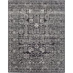 a black and white rug with an intricate design