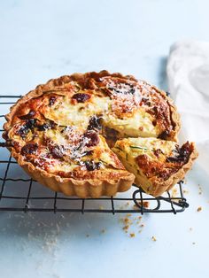 a quiche sitting on top of a wire rack