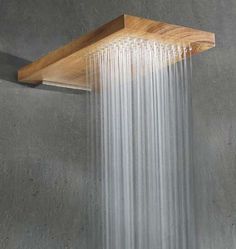 a shower head with water flowing from it