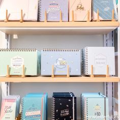 many notebooks are lined up on the shelves