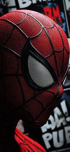 a close up of a spiderman mask on display