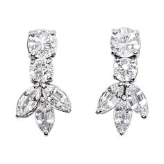 White Sapphire 3.78 carats Earrings set in 18 Karat White Gold Settings Width: 0.8 cm Length: 2.8 cm Total Weight: 5.60 grams "We first opened doors in 1980 when it was then situated in the vicinity of the Victory Monument; a small and modest storefront with a couple of counters. From its humble beginnings to where it stands today, our company has proven its abilities as a jeweler. Since the beginning, we have been supplying fine quality pieces to dealers, wholesalers and customers worldwide. Fr Gia Certified Marquise Fine Jewelry Earrings, Classic Marquise Cluster Earrings For Anniversary, Classic Bridal Earrings With 17 Jewels For Anniversary, Classic Gia Certified Marquise Diamond Earrings, Classic Gia Certified Marquise Earrings, Classic Marquise Cut Brilliant Earrings, Classic Marquise Earrings For Anniversary, Classic Marquise Cut Earrings For Anniversary, Fall In London