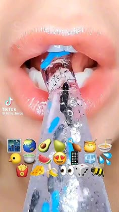 a woman's lips are covered in various emoticions as she holds a water bottle with her mouth